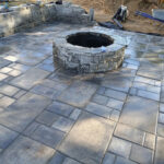 Stone firepit at a house installed
